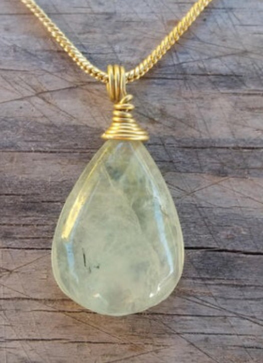 Brass necklace with a Prehnitez crystal pendant